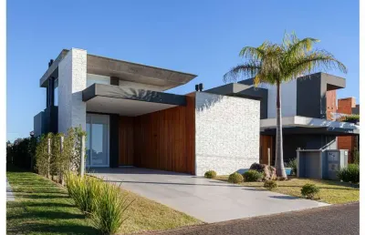 Casa à venda no bairro condomínio reserva das águas - torres/rs