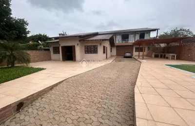 Casa com 4 quartos à venda na rua júlia correia de barros, 17, feitoria, são leopoldo, 430 m2 por r$ 1.250.000