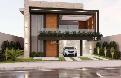Casa duplex à venda em condomínio com 3 suítes e 4 vagas de garagem.