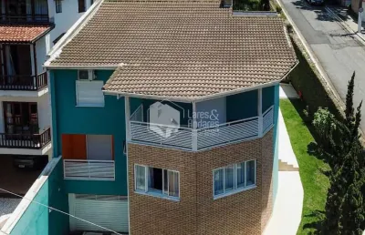 Casa em condomínio para venda com 5 quartos, sendo 4 suítes, 370m²