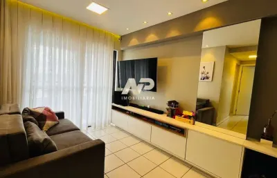 Apartamento com 2 quartos (1 suíte), 53m², varanda, sala para 2 ambientes, móveis planejados, cozinha e área de serviço