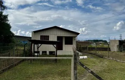 Terreno com chalé em bom estado no loteamento arroio grande