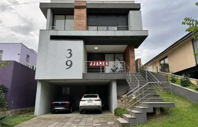 Casa em condomínio fechado com 3 quartos à venda na tapir rocha, 8500, condomínio buena vista, viamão por r$ 1.690.000