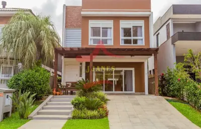 Casa em condomínio fechado com 4 quartos à venda na tapir rocha, 8500, condomínio buena vista, viamão por r$ 1.915.000
