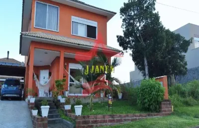 Casa em condomínio fechado com 3 quartos à venda na tapir rocha, 8500, condomínio buena vista, viamão por r$ 1.299.000