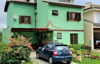 Casa em condomínio fechado com 3 quartos à venda na tapir rocha, 8500, condomínio buena vista, viamão por r$ 900.000