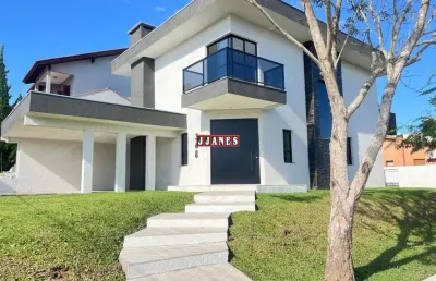 Casa em condomínio fechado com 3 quartos à venda na eucaliptos esquina ciprestes, 348, cantegril, viamão por r$ 900.000