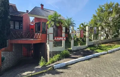 Casa em condomínio fechado com 4 quartos à venda na rua peroba, 127, cantegril, viamão por r$ 2.100.000