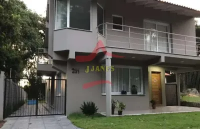 Casa em condomínio fechado com 3 quartos à venda na rua cipreste, 201, cantegril, viamão por r$ 990.000