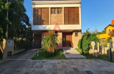 Casa em condomínio fechado com 5 quartos à venda na grapia, 121, cantegril, viamão por r$ 1.700.000
