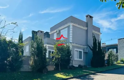 Casa em condomínio fechado com 3 quartos à venda na tapir rocha, 8500, condomínio buena vista, viamão por r$ 1.800.000