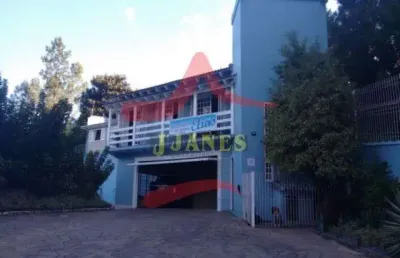 Casa com 4 quartos à venda na joao carlos vialle dias, 1347, tarumã, viamão por r$ 2.490.000