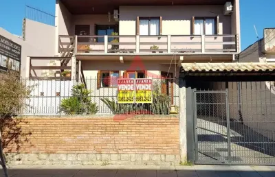 Casa com 5 quartos à venda na rua quintino bonetto, 135, santa isabel, viamão por r$ 850.000