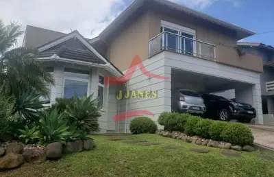 Casa em condomínio fechado com 4 quartos à venda na periquitos, 123, vila elsa, viamão por r$ 1.300.000