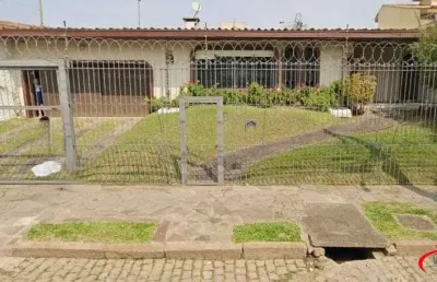 Casa com 4 quartos à venda na Rua Jacipuia, 201, Guarujá, Porto Alegre