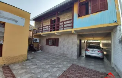 Casa com 3 quartos à venda na Rua Império, 130, Vila Nova, Porto Alegre