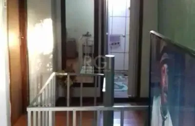 Casa com 4 quartos à venda na Beco dos Rossatos, 65, Campo Novo, Porto Alegre
