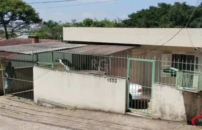 Casa com 4 quartos à venda na Avenida Vicente Monteggia, 1553, Cavalhada, Porto Alegre