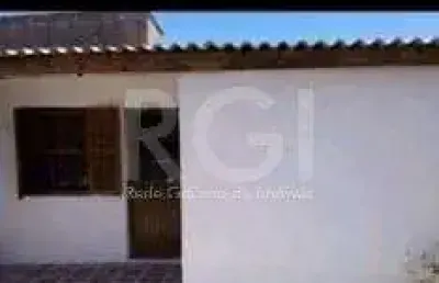 Casa com 3 quartos à venda na Acesso Cinco, 4994, Restinga, Porto Alegre