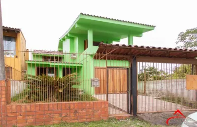 Casa com 3 quartos à venda na Rua Augusto de Lourenço Martins, 110, Vila Nova, Porto Alegre