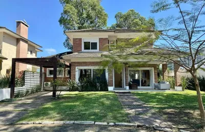 Sobrado à venda, 4 quartos, 3 suítes, 2 vagas, condomínio carmel - xangri-lá/rs