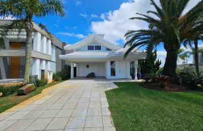 Sobrado à venda, 4 quartos, 4 suítes, 2 vagas, condomínio enseada lagos de xangri-lá - xangri-lá/rs