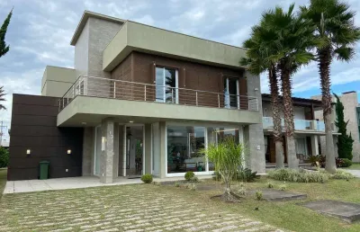 Sobrado à venda, 5 quartos, 4 suítes, 2 vagas, condomínio ventura club - xangri-lá/rs