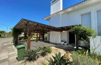 Sobrado à venda, 4 quartos, 4 suítes, 2 vagas, condomínio green village - xangri-lá/rs
