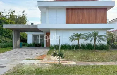Sobrado à venda, 4 quartos, 4 suítes, 2 vagas, green village golf club - xangri-lá/rs