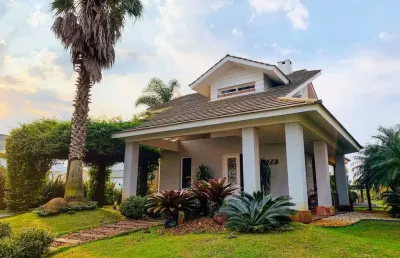 Sobrado à venda, 4 quartos, 4 suítes, 2 vagas, condomínio quintas do lago - xangri-lá/rs