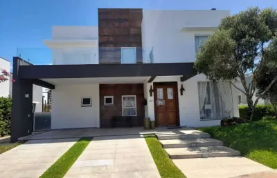 Sobrado à venda, 5 quartos, 5 suítes, 2 vagas, condomínio quintas do lago - xangri-lá/rs