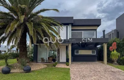 Sobrado à venda, 4 quartos, 4 suítes, 2 vagas, condomínio enseada lagos de xangri-lá - xangri-lá/rs