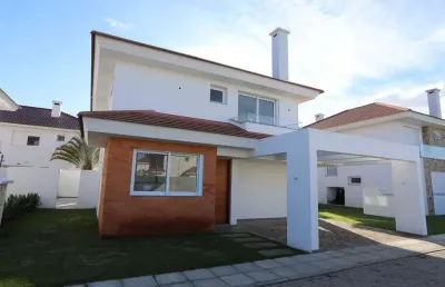 Sobrado à venda, 4 quartos, 4 suítes, 2 vagas, condomínio green village - xangri-lá/rs