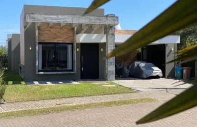 Casa à venda, 4 quartos, 4 suítes, 2 vagas, condomínio sea coast - xangri-lá/rs