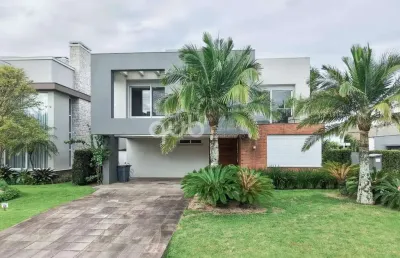 Sobrado à venda, 4 quartos, 4 suítes, 2 vagas, condomínio enseada lagos de xangri-lá - xangri-lá/rs