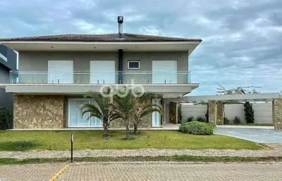 Sobrado à venda, 4 quartos, 4 suítes, 3 vagas, condomínio sea coast - xangri-lá/rs