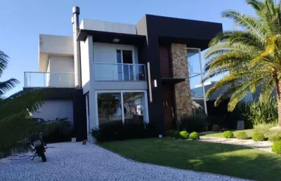 Sobrado à venda, 4 quartos, 4 suítes, 2 vagas, condomínio quintas do lago - xangri-lá/rs
