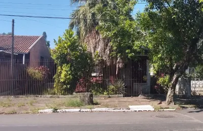 Terreno com casa antiga à venda – excelente localização!