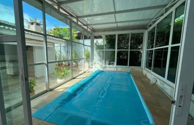 Casa em condomínio fechado com 4 quartos para alugar no Nova Uberlândia, Uberlândia 