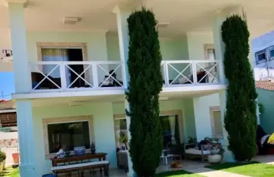 Casa em condomínio fechado com 4 quartos à venda na Rua Francisco das Mercês, 640, Buraquinho, Lauro de Freitas