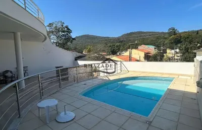 Casa moderna no condomínio village santa mônica em várzea das moças