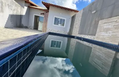 Casa com piscina, 2 quartos e área gourmet em itanhaém.