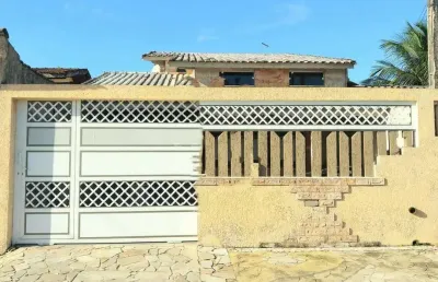 Casa com 4 quartos e espaço para piscina em peruíbe.