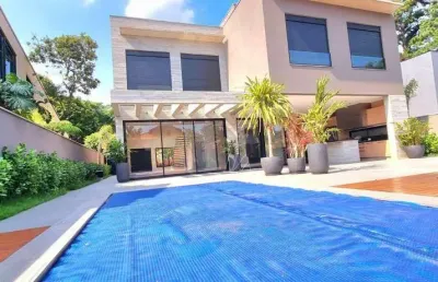 Belíssima casa nova com 4 suítes, área gourmet, sauna, piscina, semi-mobiliada