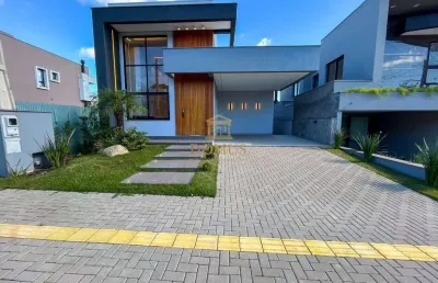 Casa em condomínio fechado com 3 quartos à venda na rua adolfo inácio de barcelos, 1490, centro, gravataí por r$ 1.490.000