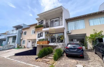 Casa em condomínio fechado com 3 quartos à venda na rua deputado hugo mardini, 1780, passo das pedras, porto alegre por r$ 1.200.000