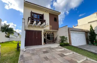 Casa em condomínio fechado com 3 quartos à venda na rua deputado hugo mardini, 1780, passo das pedras, porto alegre por r$ 880.000