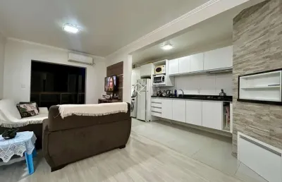 Apartamento de 2 dormitórios com sacada fechada e móveis planejados no verena