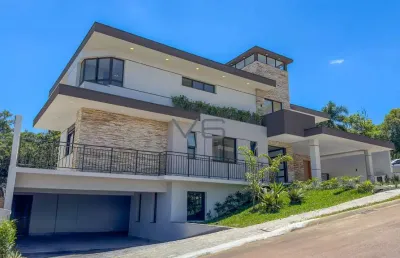 Casa alto padrão com 5 suítes 567,61m² com piscina de borda infinita, bosque privativo e espaço gourmet - imperdível!