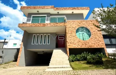 Casa mobiliada de alto padrão com 4 quartos, 290 m² privativos, 4 vagas de garagem, no bairro santa felicidade.
